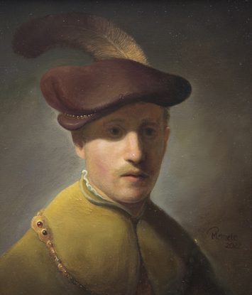 Young man with gold chain and plumed hat.