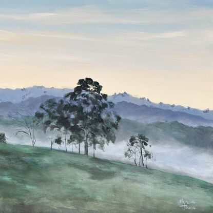 A misty morning in the countryside of Tasmania.