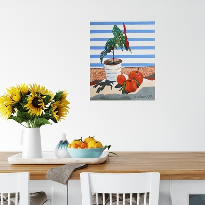 A vibrant green leaf with white spots and a deep maroon underleaf, in a white vase with 3 large red apples against white shutters and a clear blue sky.