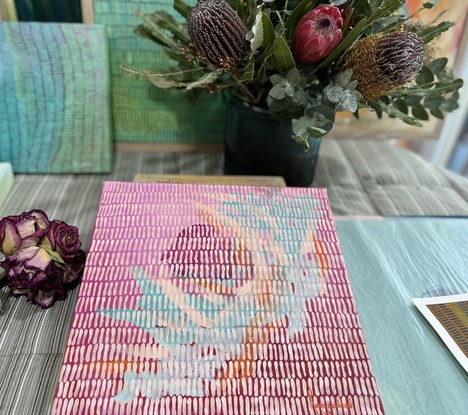 Abstract banksia and proteas in pastels and pinks, over laid with a veneer of organic shaped brush strokes. Pinks, marshmallow tones that change according to the light source. 