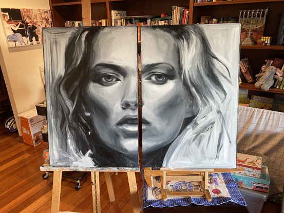 A close up of the beautiful Kate Moss. 
Note this is 2 paintings that make up the complete picture.