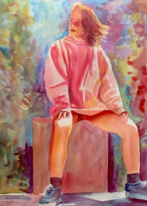 Woman sitting in the sunshine.