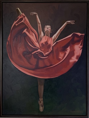 A ballet dancer in a red dress.