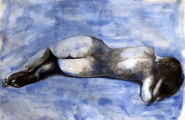 A woman lying down in a blue background