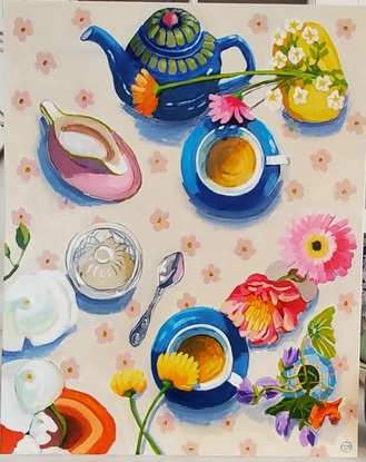 An aerial view of a table set for afternoon tea with cream floral tablecloth blue cups and saucers and a blue and green teapot.  A glass sugarbowl and variety of flowers in vases.