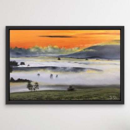 Foggy countryside with mountains and  Orange sky