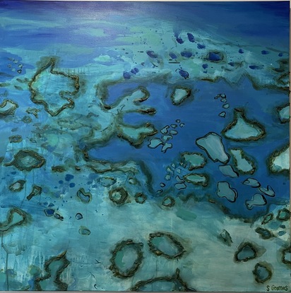 The work is an aerial view of the reef incorporating raised element to bring the painting to life.  It's as though you can reach out and touch the reef.