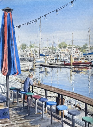 Bar side view of the Cullen Bay harbour and boats.