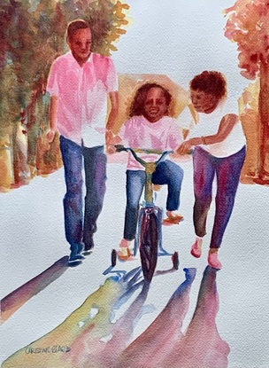 Family with new bike in the sunshine.