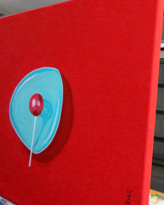 gorgeous yummy red lollipop on a minty green dish!