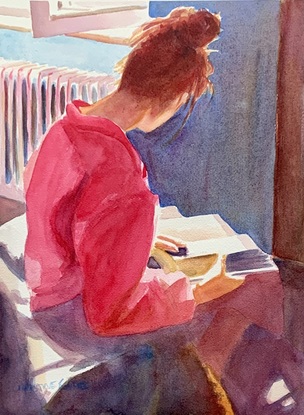 Woman reading in the sunshine.