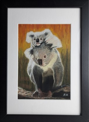 A mother Koala with her Joey clinging to her back fleeing the raging Bushfire in the background.