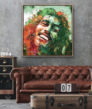 Portrait of Bob Marley in vibrant green and orange transparent colours. 