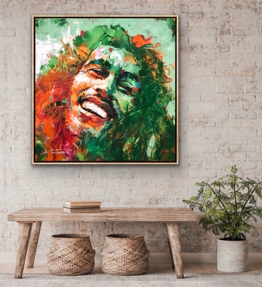 Portrait of Bob Marley in vibrant green and orange transparent colours. 