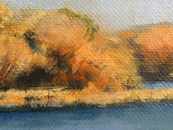 Small impressionist landscape river painting by Australian artist Victoria Collins, in soft autumn tones of ochre and blue. 