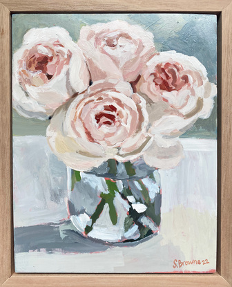 pastel pink roses in a vase