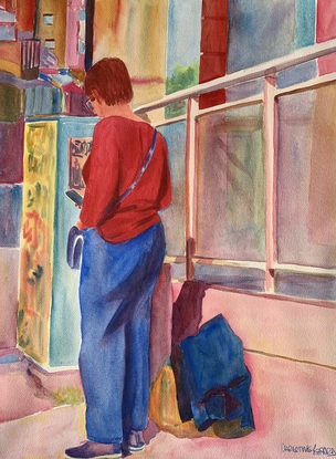 Woman waiting in the street.