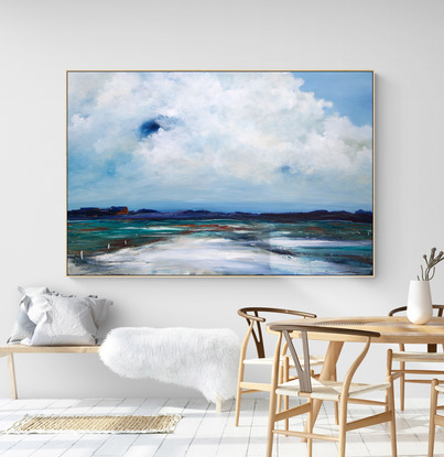 Abstract seascape in grey blue  and teal with mountain range in the horizon under a dramatic cloudy sky.