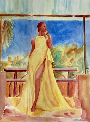 Woman models a yellow gown.