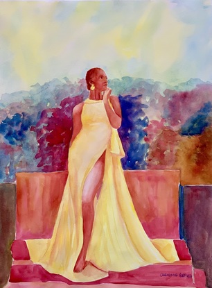 Woman models a yellow gown.