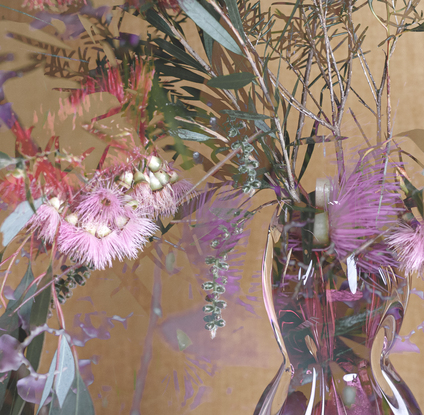 Floral bouquet with vintage glass vase.