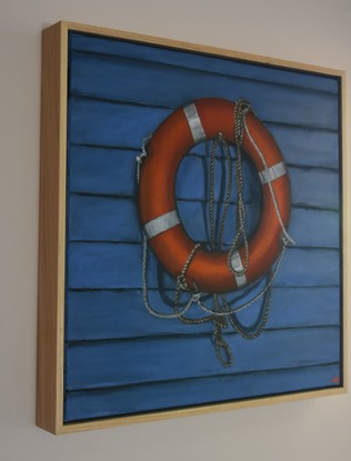 An orange buoy with drooping ropes hangs against a blue weatherboard wall  

This work will be on display at Bluethumb's Melbourne Gallery for the exhibition 'Rising Realism' from April 12th.