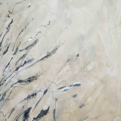 An abstract of wild grass and leaves in light grey, beige and white with silver leaf.  