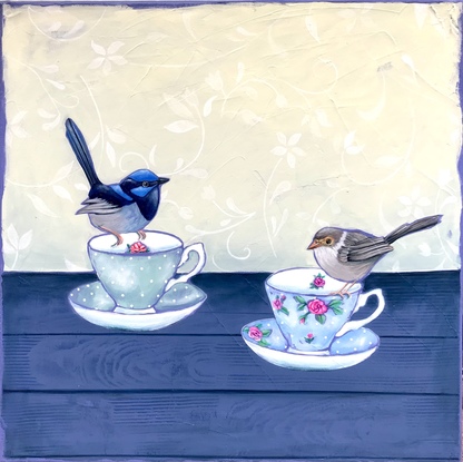 A male and female fairy wren sitting on the edge of tea cups and saucers.