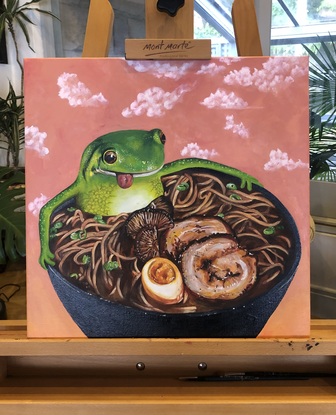 Frog having a bath in a bowl of ramen