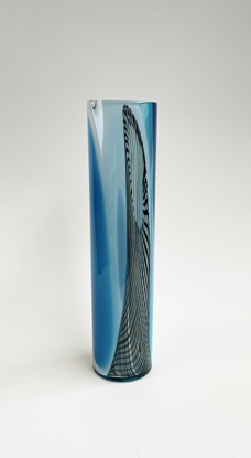 Tall cylinder vase with a mix of blue and white transparent and opaque colours