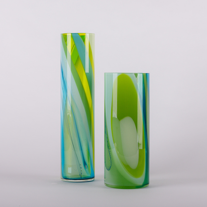 Wide cylinder vase in a mixture of greens and blues