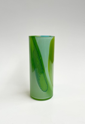 Wide cylinder vase in a mixture of greens and blues