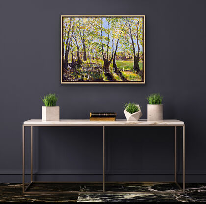 A buttery yellow sunset caught behind a beautiful series of trees. The shadows are throwing to soft brown greys and mauves. The whole landscape is shimmering in the sunlight. Shadows in the front of the painting add interest to the scene.  A moment caught in time. 