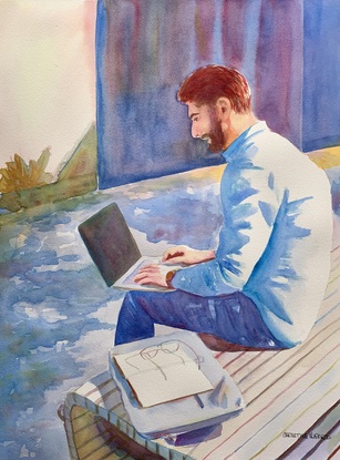 Man working on his laptop.