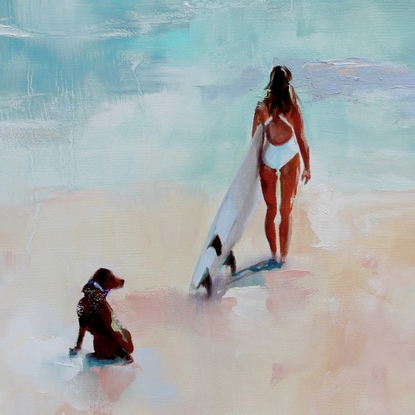 Surfer girl on beach with dog