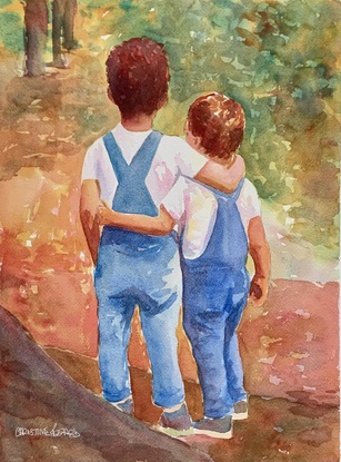 Young boys walk in the woods.