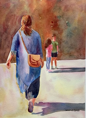 Woman walks in the street.