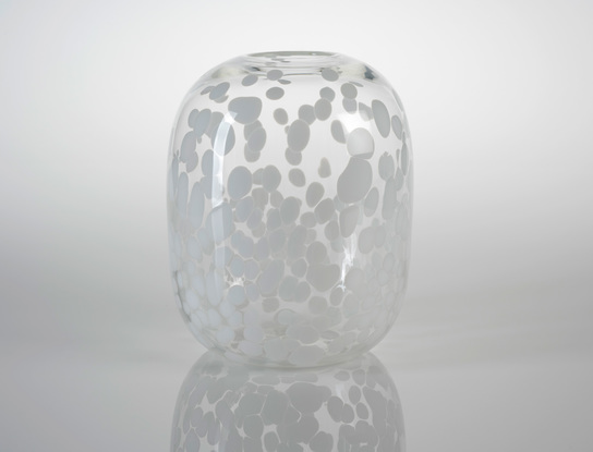 Large, rounded clear glass vase with opaque white spots