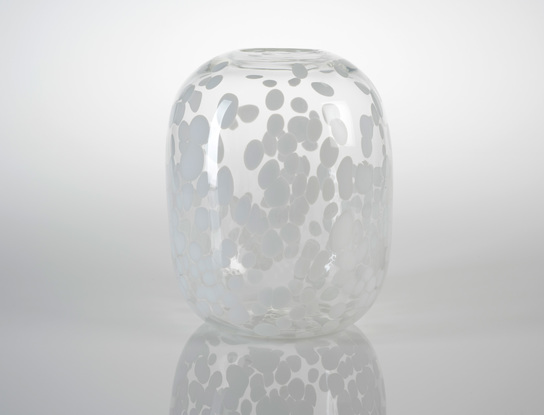 Large, rounded clear glass vase with opaque white spots