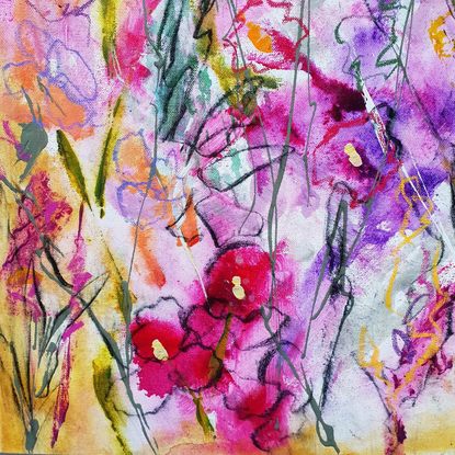 An abstract landscape of bright vivid flowers in pink, red, purple, orange, yellow and greens