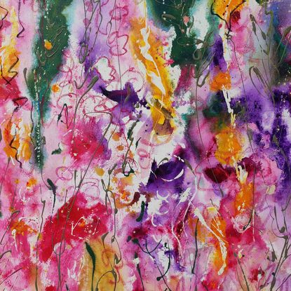 An abstract landscape of bright vivid flowers in pink, red, purple, orange, yellow and greens