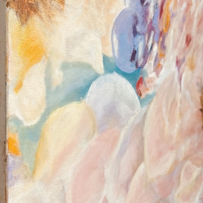 An impressionistic painting of spring flowers strewn  and reflected in water,
This complex painting has many subtle variations in bright yet soft colour tones of yellows, pinks, and purples with a background of soft green and blue, that create depth and harmony. The shapes and curves invite the eye to dance across the canvas in pleasing and surprising absorbing manner.