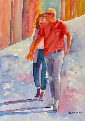 Couple walking in the street.