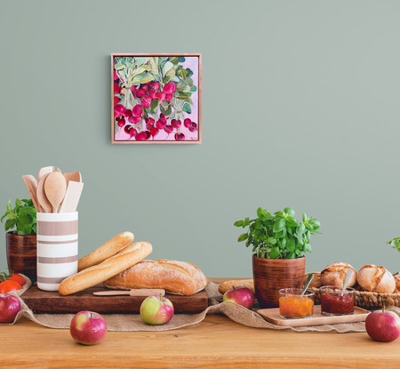 Bunches of red radishes with green stalks and leaves on a mauve background 