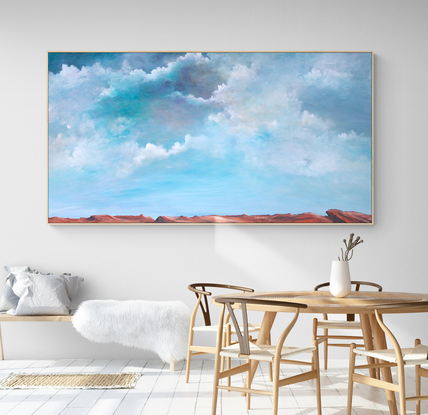 Dramatic and highly textured brightly coloured cloudscape over  tan earthy clifftop. 