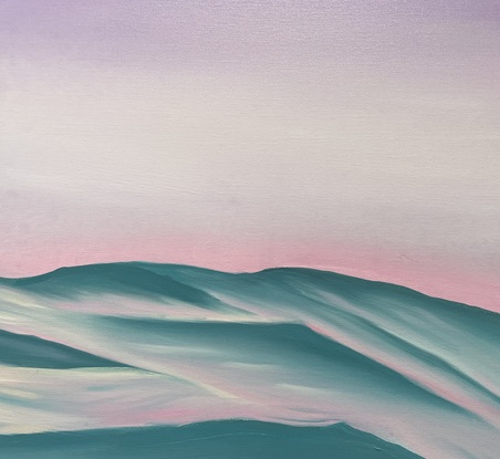 Purple sky over light turquoise ripples and a view of underwater