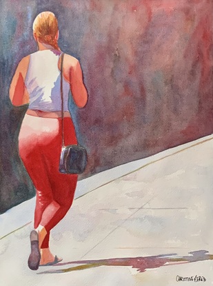 Woman walking in the street.