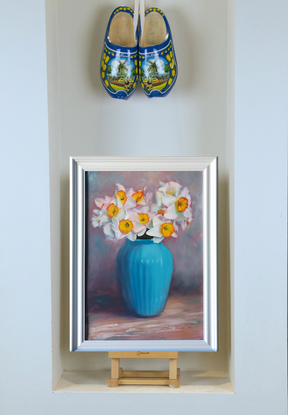 Spring flowers Daffodils in turquoise vase