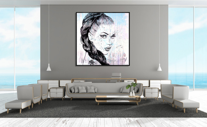 A large canvas painting using acrylics.  An abstract splash of colours on white/cream is the backdrop for the simple sketch (in black)  the face of a beautiful woman with intense eyes that follow you around the room.  She has a long braid of dark hair that feames her face.  The artist has skillfully sketched every hair.  
On the bare shoulder to the woman is a tattoo - the symbol for luck!

It is the type of painting that can fit any room and will have impact while the subtle colours accenting the design and decor of the room.