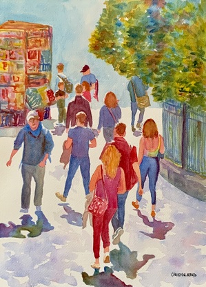 People walking in the sunshine.